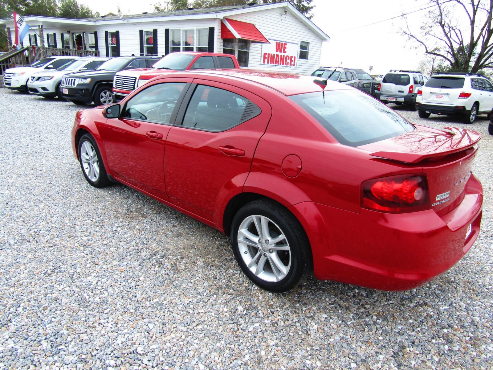 2012 Red Dodge Avenger SXT (1C3CDZEG1CN) with an 3.6L V6 DOHC 24V engine, Automatic transmission, located at 15016 S Hwy 231, Midland City, AL, 36350, (334) 983-3001, 31.306210, -85.495277 - Photo #4